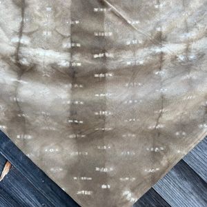 A closeup of the scarf