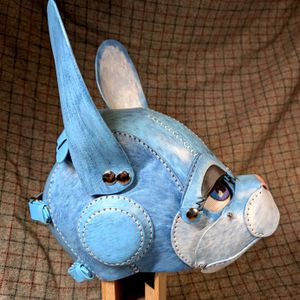 Profile view of Ocean bun in realistic blue paint