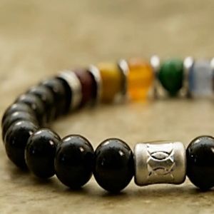 8" - Black onyx, ruby red jade, golden tigereye, orange jade, green quartz, indigo, amethyst, hematite, and lapis