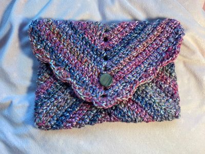Pink, purple, and grey with round grey button