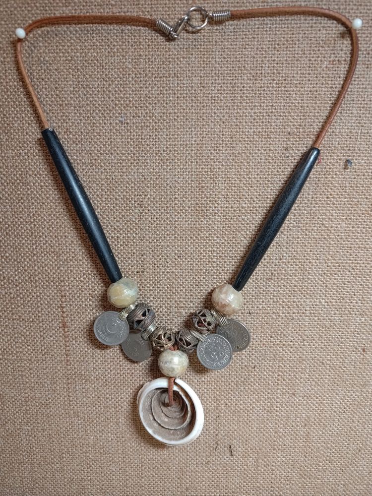 Tribal coin and statement shell necklace