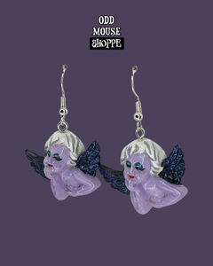 A side view of the pair of earrings