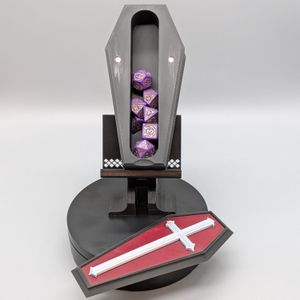 It easily holds an entire set of standard dice. Or around 12 ten-sided dice. Don't ask.
