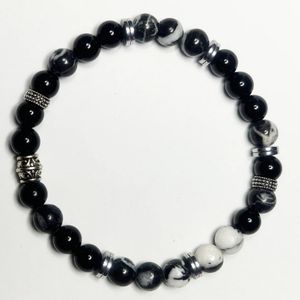 8", ebony blackwood, zebra jasper, and hematite with base metal spacers