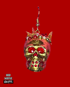 A front view of the skull earring