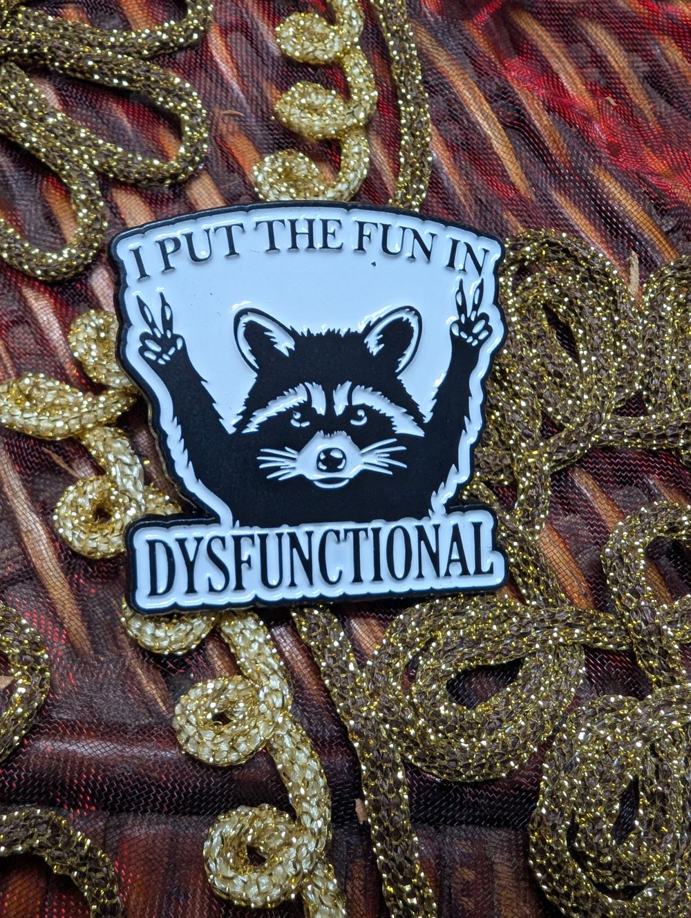 Raccoon pin 