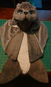 Coat with head 