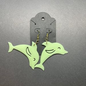 Dolphins with gold-tone hooks