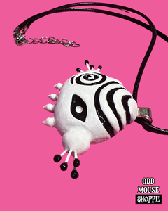 The other side of the sculpted pendant