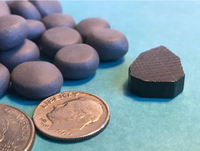 This picture shows my stone tokens alongside a generic token to show thickness. These pieces have been crafted with size and weight in mind to keep them feeling authentic while still upgrading the appearance.