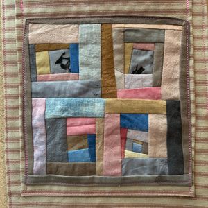 Close up of middle pocket patchwork 