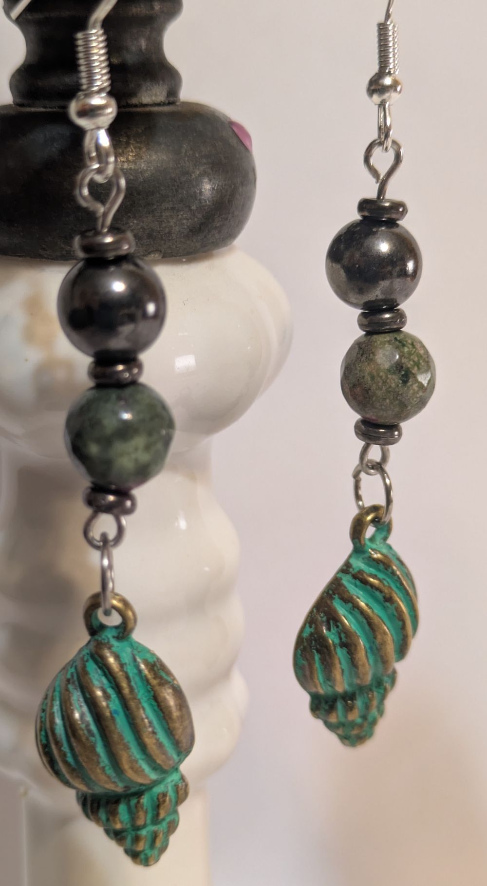 Snail shell earrings with patina and natural stone bead accents