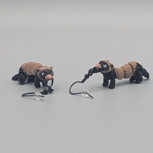 Just a pair of articulated ferrets who happen to hang from your ears.
