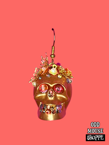 A front view of the skull earring