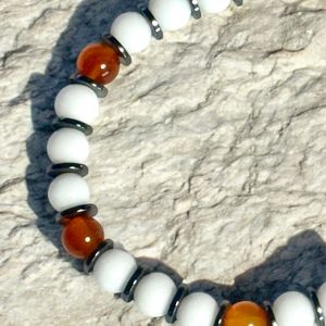8" Carnelian stones, Snow Jade, and Hematite beads