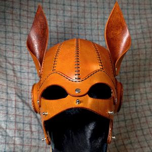 A Front View of the Diesel Pup Hood in Saddle Tan with the snout detached