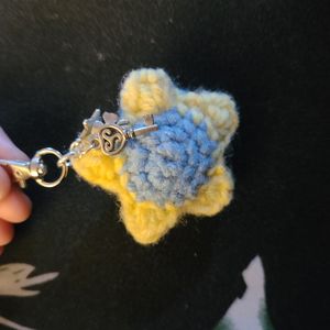yellow and blue bag charm