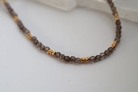 Faceted smoky quartz with galvanized gold beads on the Mira Necklace