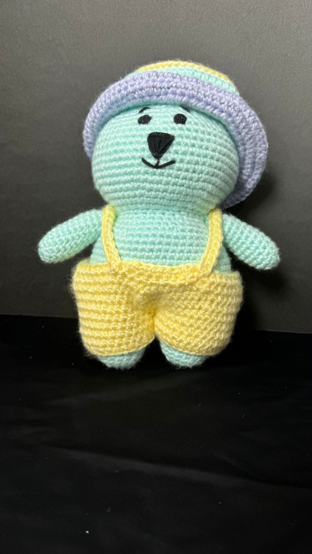 Teal amigurumi bear