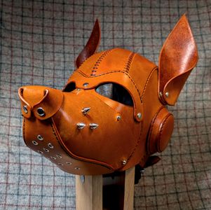 1/4 view of the Diesel Pup Hood in Saddle Tan