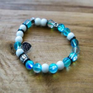 7" - Blue mermaid, snow jade, and hematite with base metal spacers