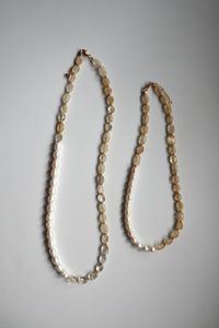 The 23" and 17" versions of the Dawn Necklace