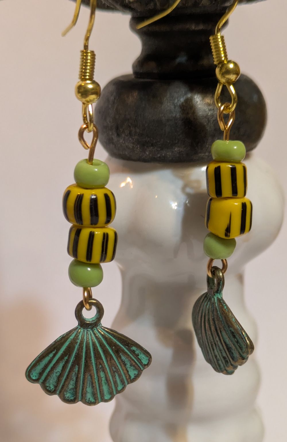 Seashell earrings with lamp glass yellow bead accents