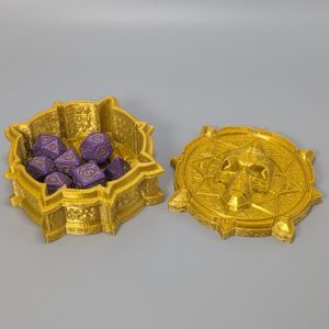 The vault will comfortably hold a standard set of TTRPG dice.