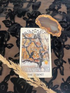 The hermit from the Crow Tarot