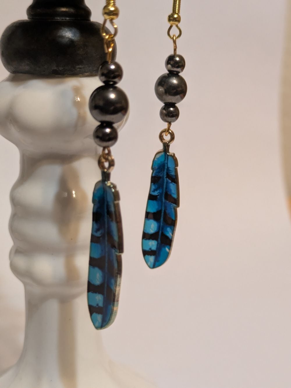 Blue bird enamel feather earrings with onyx black bead accents