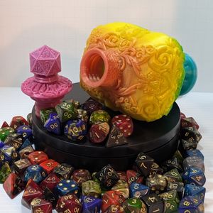 The bottle, laying on its side with the stopper beside it, surrounded by colorful TTRPG dice.