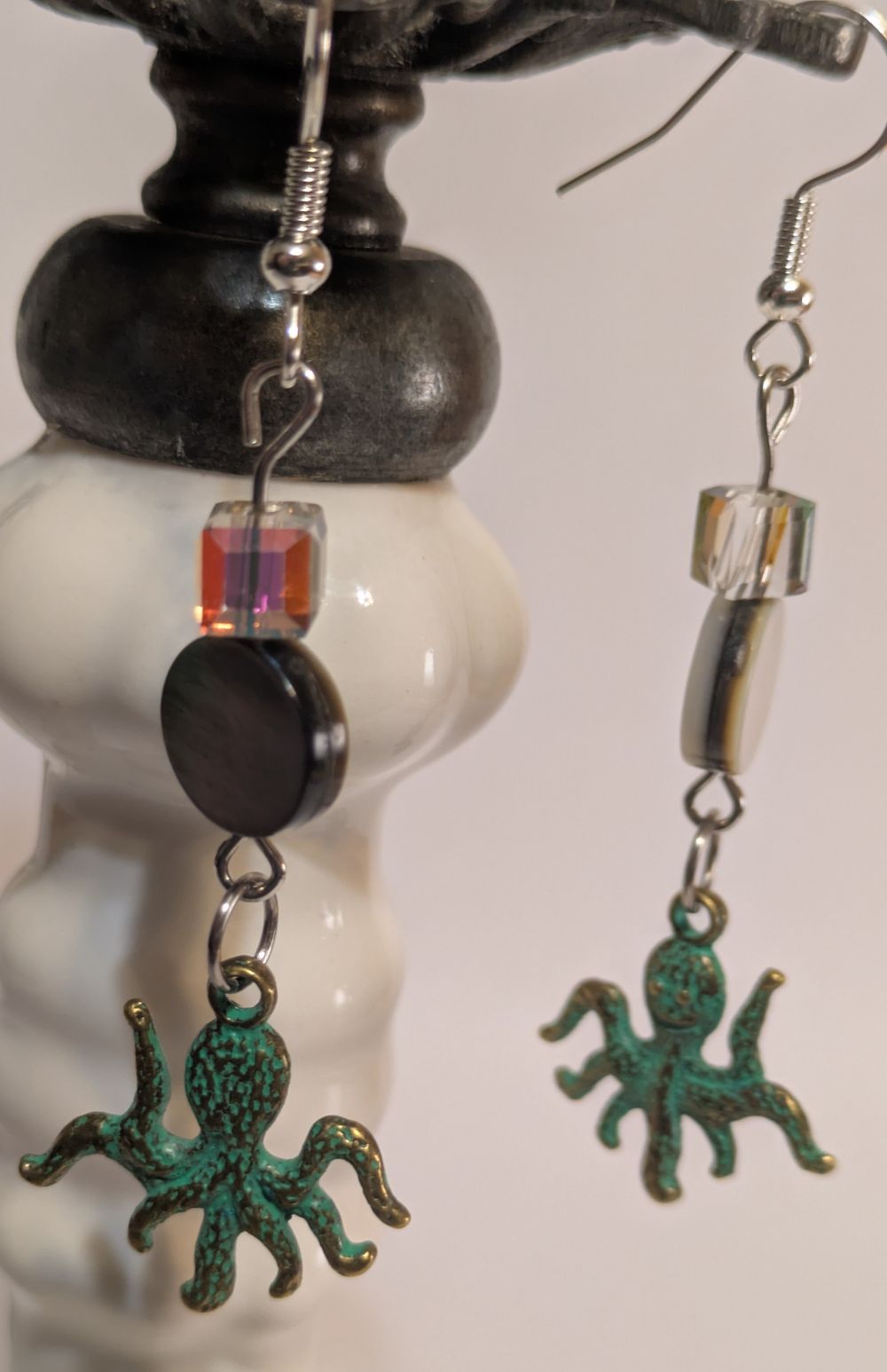 Octopus charm earrings with patina. Abalone shell and refrac...