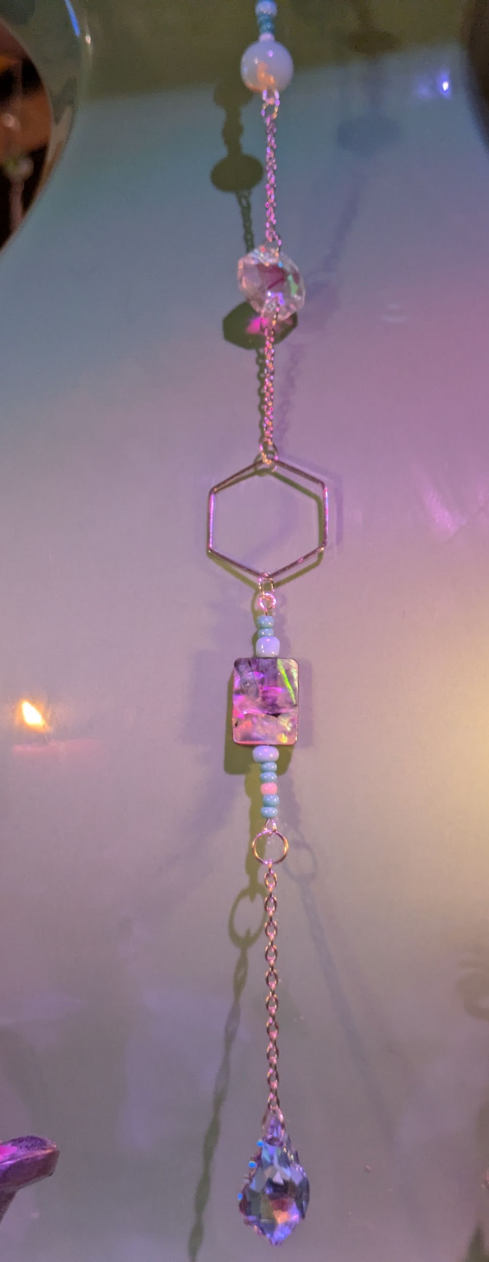 Ornamental sun catcher with faux abalone