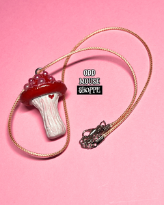 A zoomed out look of the mushroom necklace