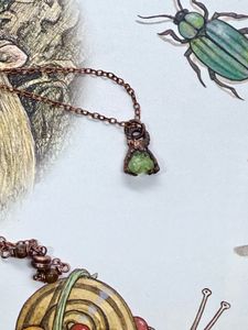 Small, dainty raw peridot copper electroformed pendant on 14” chain