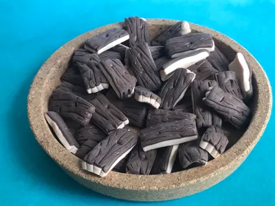 A pile of resources displayed in a bowl and ready for gameplay. A bowl will not be included in your purchase.