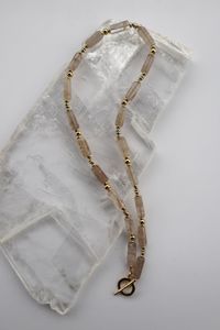 The Rutila Necklace, made with rutilated quartz