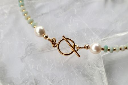 The 14k gold-filled toggle clasp on the Amara Necklace