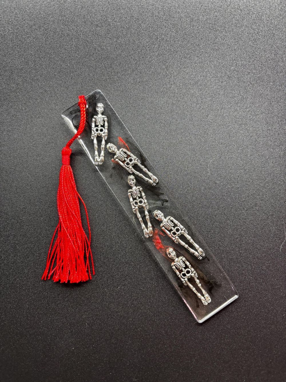 Skeleton Resin Bookmark - Clear with Vibrant Red Tassel