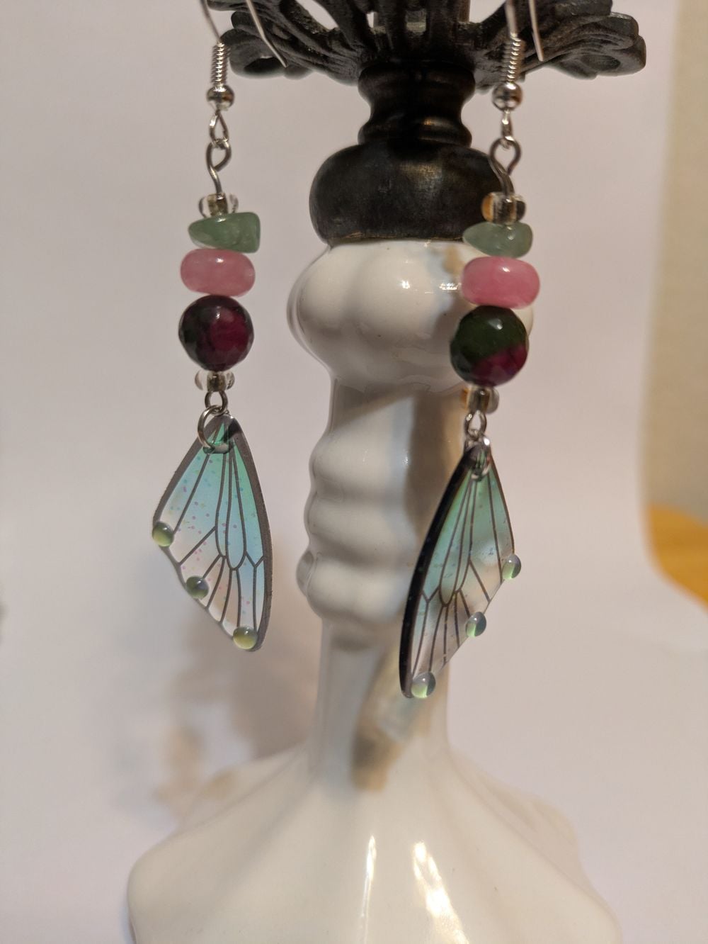 Dainty green resin butterfly wings with natural glass bead accents