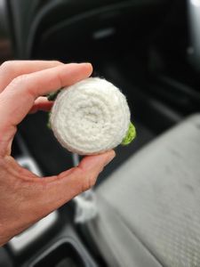 White pot with 3 tones of green leaves