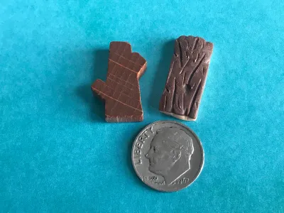 This picture shows a generic wooden piece alongside my handmade upgrade. A reviewer once noted that these upgrades are stackable, whilst most are not.