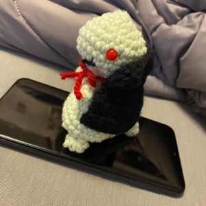 Vampy Boi on a phone left side