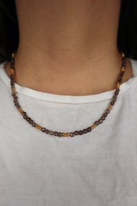 Smoky quartz and gold Mira Necklace worn alone.