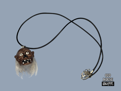 A front side view of the sculpted pendant