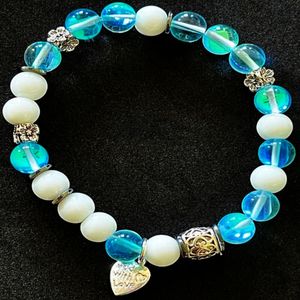 7" - Blue mermaid, snow jade, and hematite with base metal spacers